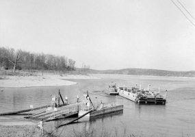 Ferry boat leaving the dock on a lake