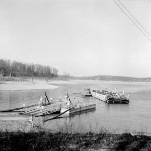 Ferry boat leaving the dock on a lake