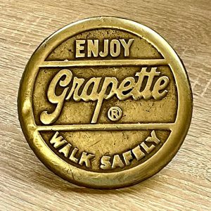 Bronze plaque "Enjoy Grapette Walk Safely