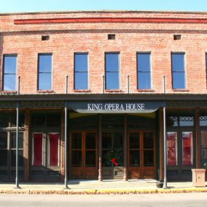 two-story brick building labeled, "King Opera House"