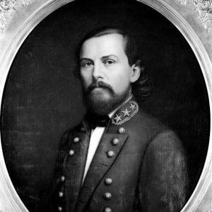 White man with long hair and beard in military uniform