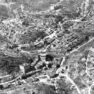 Overhead view of streets and buildings with trees