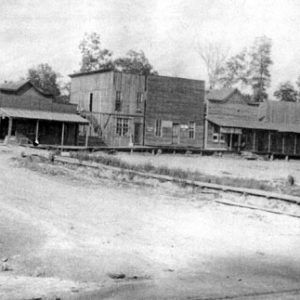 Dirt road with wooden storefronts