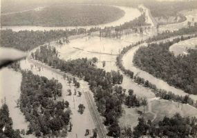 Aerial view of flooded areas along river