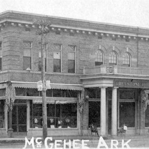 Two story brick building with covered entrance