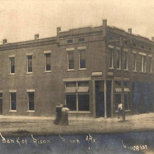 Two story brick building on street corner