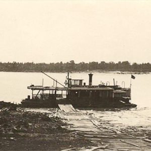 Ferry boat at dock on river