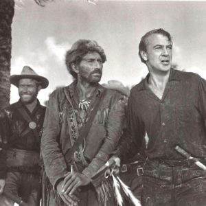 photo of four white men dressed as frontiersmen