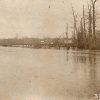 Body of water with bridge in far distance