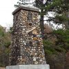 Stone and concrete monument in cemetery