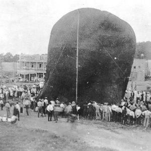 Large group of people gathered around large