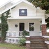 White wooden single story building