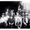 Nine white men in hats