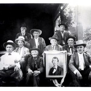 Nine white men in hats