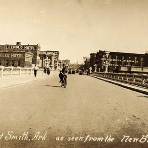 Bicycle riders on bridge