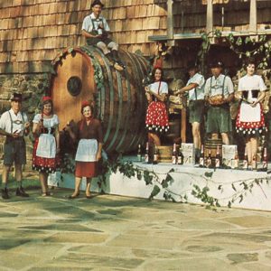 White men and women dressed in traditional Swiss garb