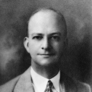 Portrait of white man in suit and tie