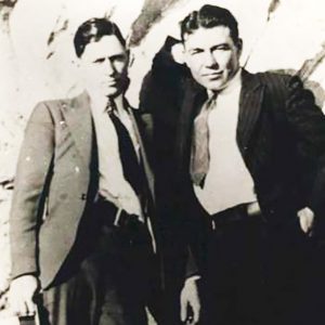 Two white men wearing suits and ties