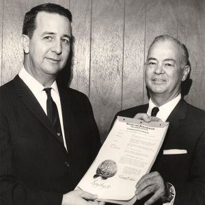 Two white men in suits