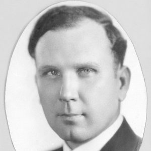 Portrait of white man in suit and tie