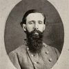 White man in military garb with beard