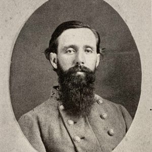 White man in military garb with beard