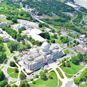 Aerial view of capitol and adjacent buildings and river