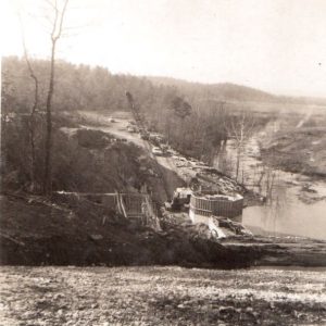 Overhead view of construction site on river