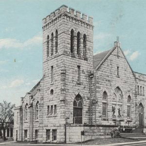 Gothic stone church building with tower