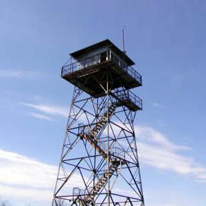 Small structure atop large tower