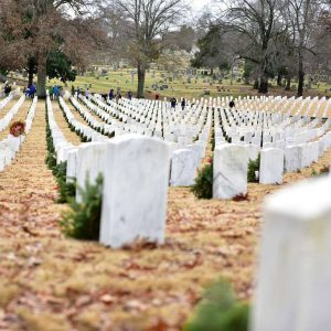 Cemetery with people and gravestones