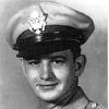 White man in military dress uniform and hat