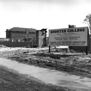 Building and sign at construction site