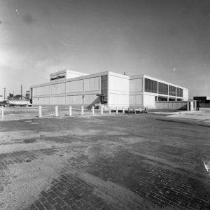 Large white boxy multistory building