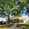 White building with angular shaped roof