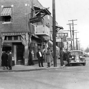 African American men standing on corner