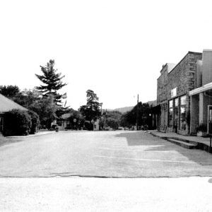 storefront and other buildings on a street