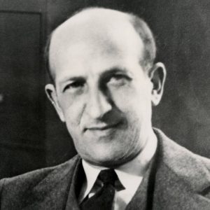 Balding white man in suit jacket