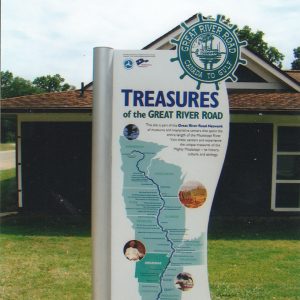 Road sign with map with "Treasures of the Great River Road" at the top