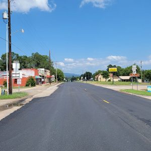 street with one-story businesses on both sides