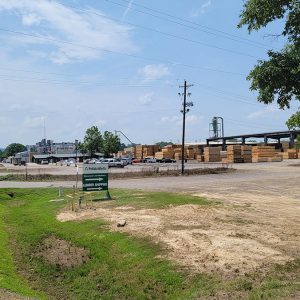 Piles of cut lumber