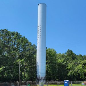 White cylindrical water tower