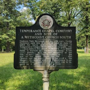 Metal sign with information about the establishment of the cemetery and a logo at the top for the American Revolution Bicentennial 1776 to 1976