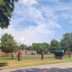 Single story red brick building