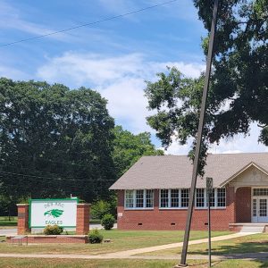 Single story red brick building