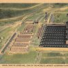 Large industrial plant with rectangular buildings seen from above