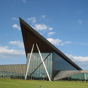 Modernistic glass and metal building with large