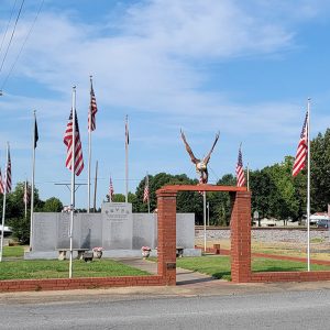 Brick arch with an American eagle statue on top