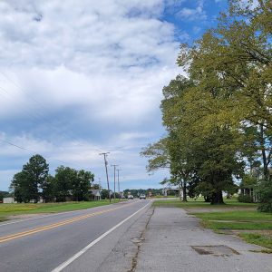 Small town road curving toward intersection