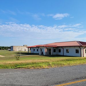 Yellow brick buildings with red roofs and roads